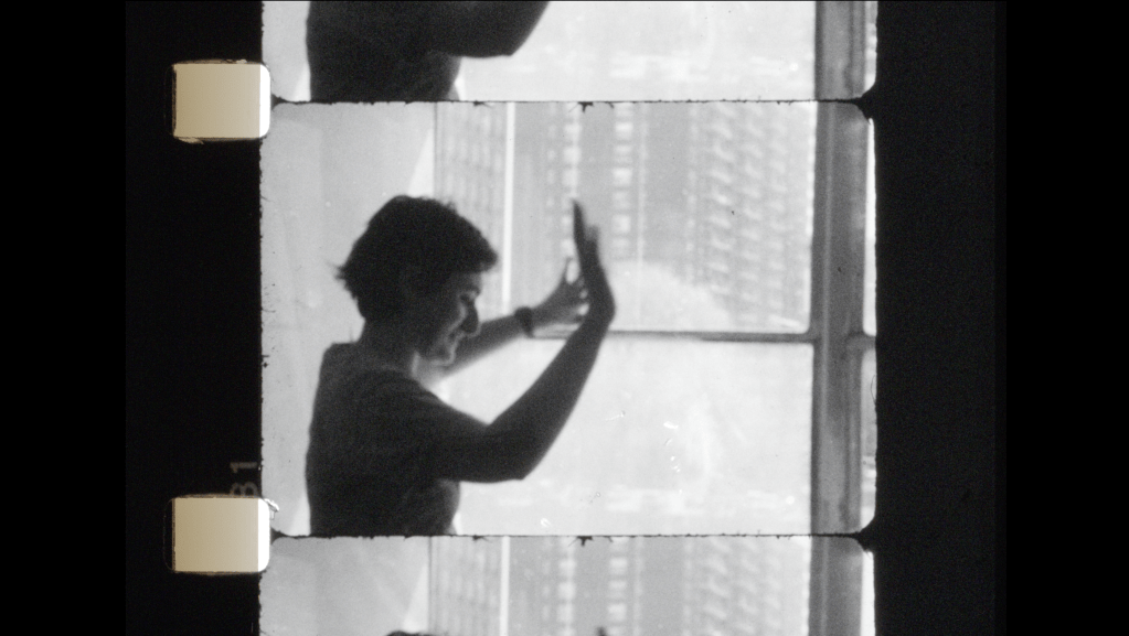black and white image of film strip depicting tati chavitage at work.